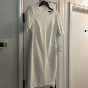 White, Tommy Hilfiger size 4 dress.  Back hidden zipper.  Brand new